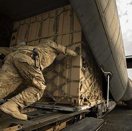 Serco Wins $107M Mideast Base Support Contract From Australian Defence Force adf soldier loading equipment